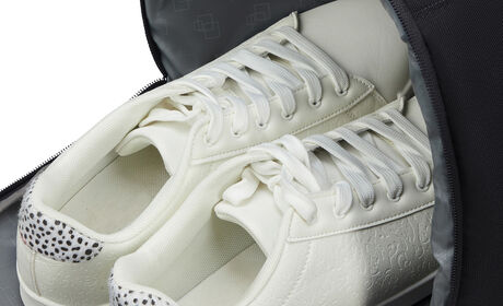 Bolsillo lateral para zapatos