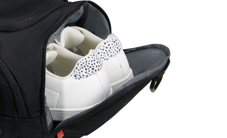 Bolsillo lateral para zapatos